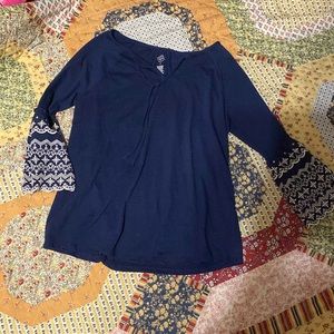 Dark blue top with cute designs on sleeves